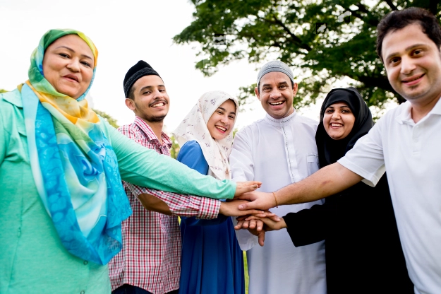 Activities - muslim group of friends stacking hands